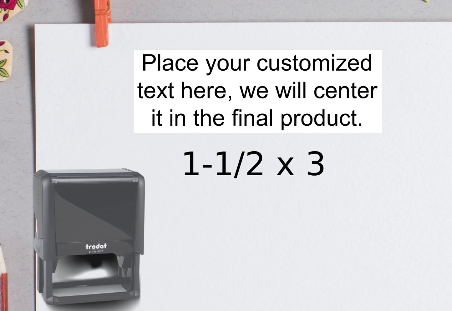 blank-white-page-with-clothes-peg-surrounded-with-stationeries-gray-background