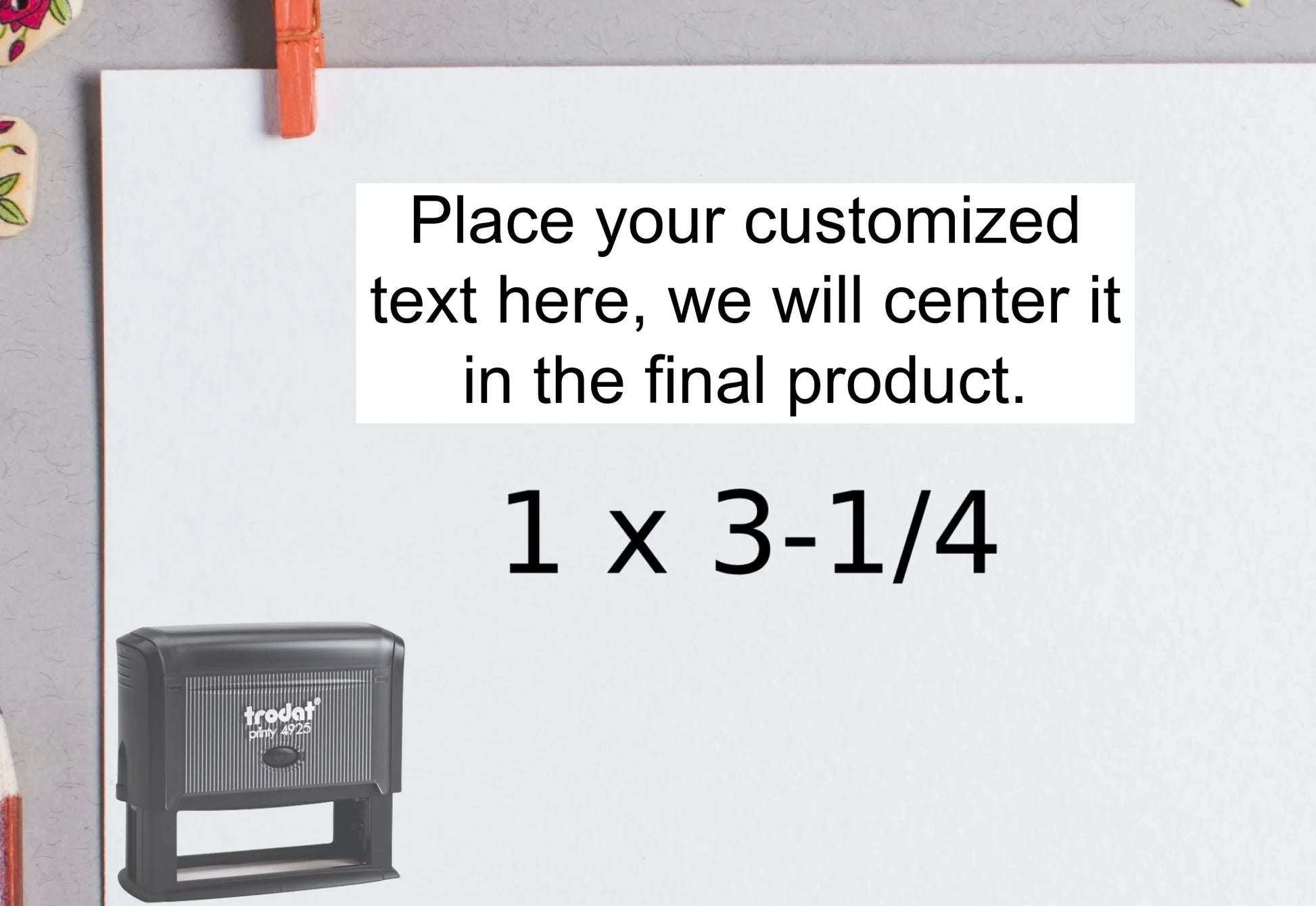 blank-white-page-with-clothes-peg-surrounded-with-stationeries-gray-background