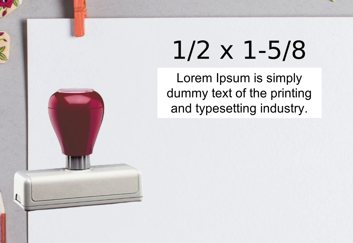 blank-white-page-with-clothes-peg-surrounded-with-stationeries-gray-background