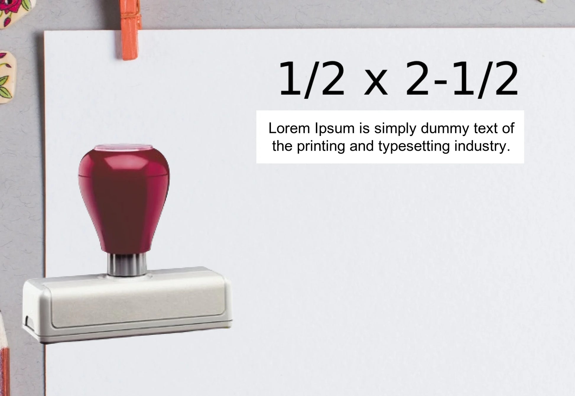 blank-white-page-with-clothes-peg-surrounded-with-stationeries-gray-background