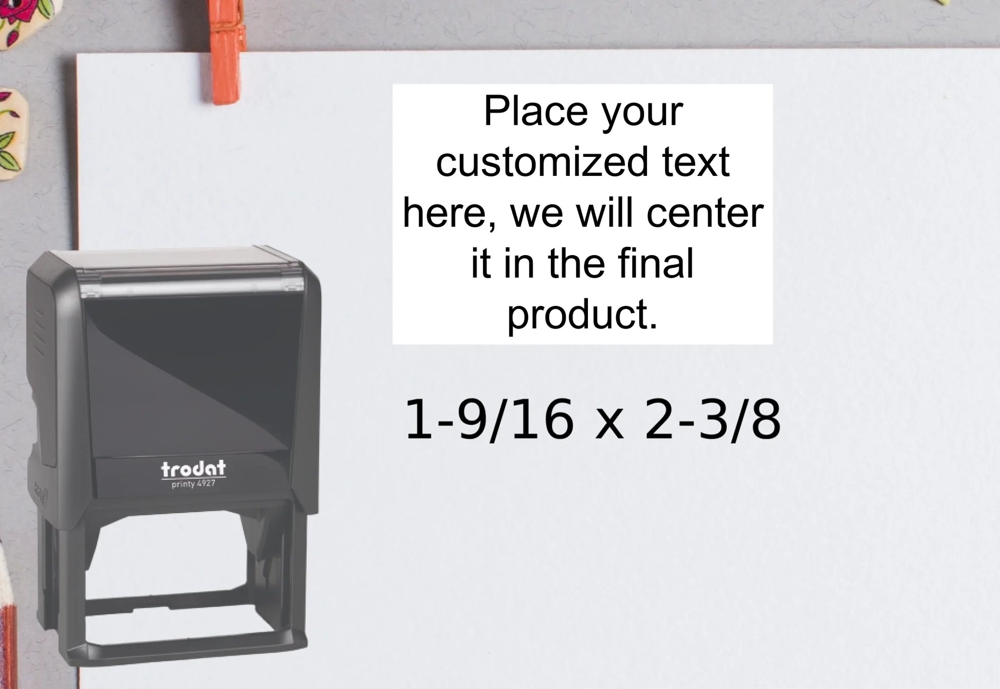 blank-white-page-with-clothes-peg-surrounded-with-stationeries-gray-background