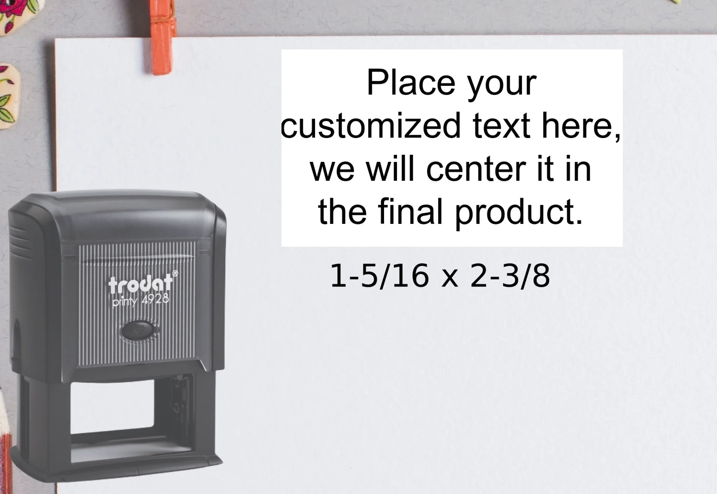 blank-white-page-with-clothes-peg-surrounded-with-stationeries-gray-background