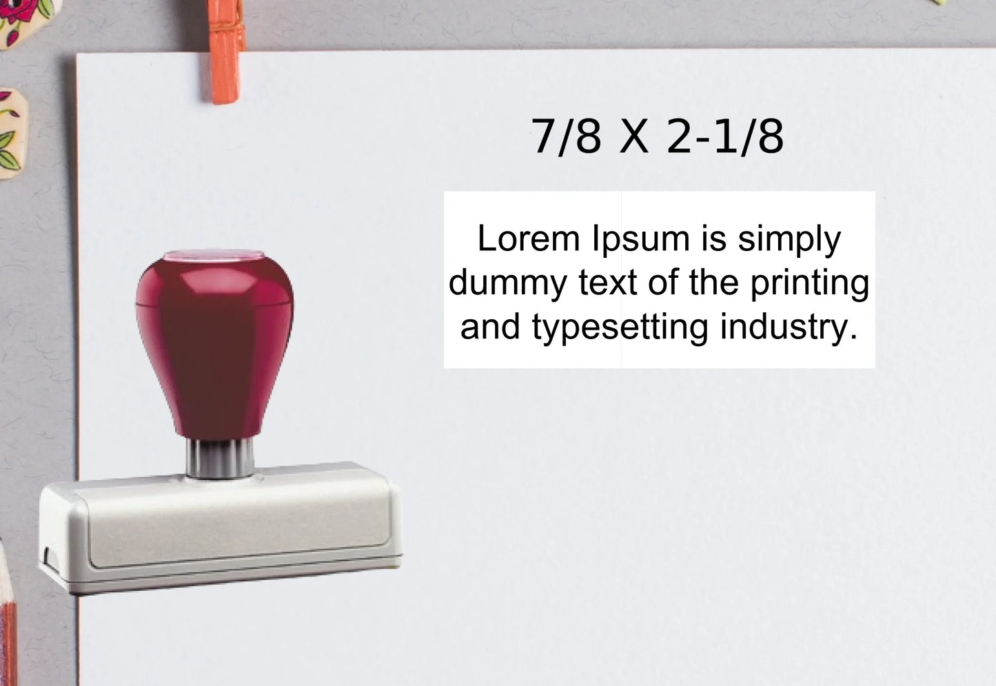 blank-white-page-with-clothes-peg-surrounded-with-stationeries-gray-background