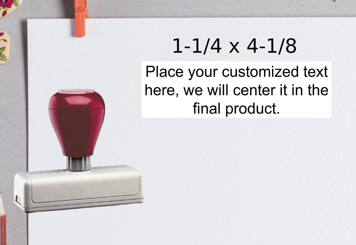 blank-white-page-with-clothes-peg-surrounded-with-stationeries-gray-background