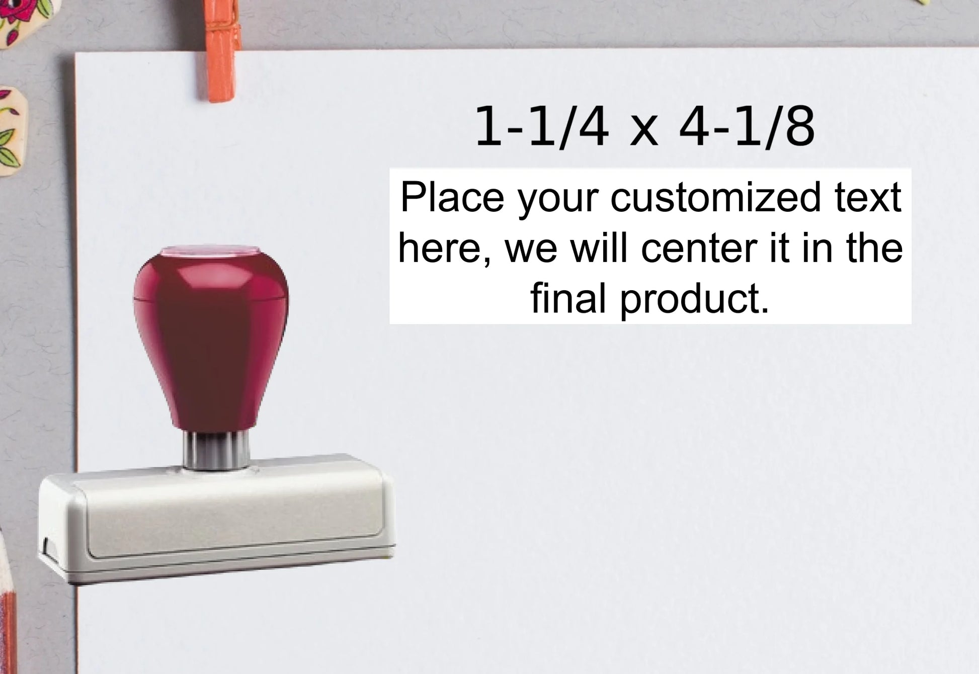 blank-white-page-with-clothes-peg-surrounded-with-stationeries-gray-background