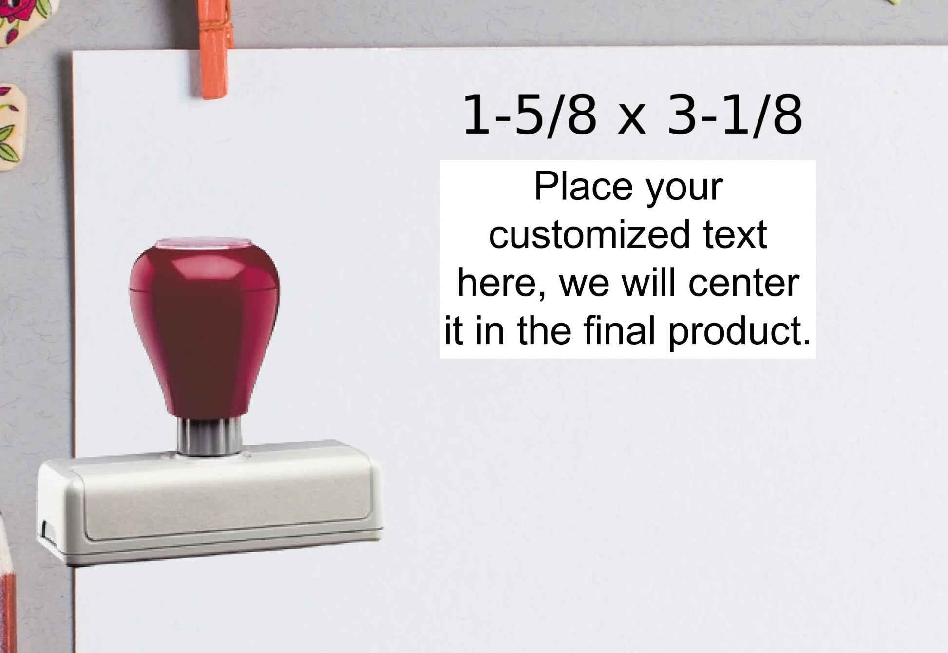 blank-white-page-with-clothes-peg-surrounded-with-stationeries-gray-background