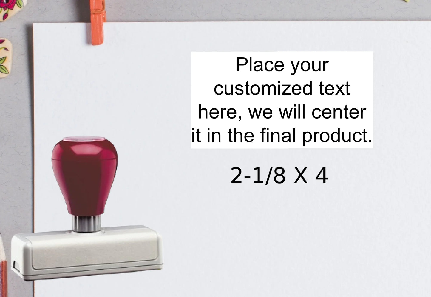 blank-white-page-with-clothes-peg-surrounded-with-stationeries-gray-background