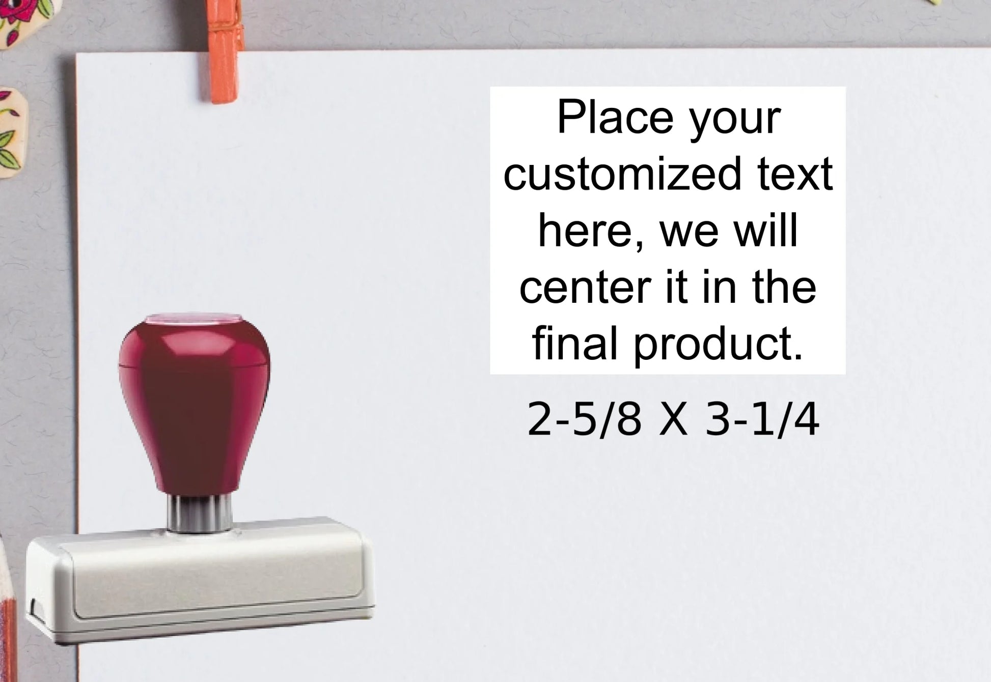 blank-white-page-with-clothes-peg-surrounded-with-stationeries-gray-background