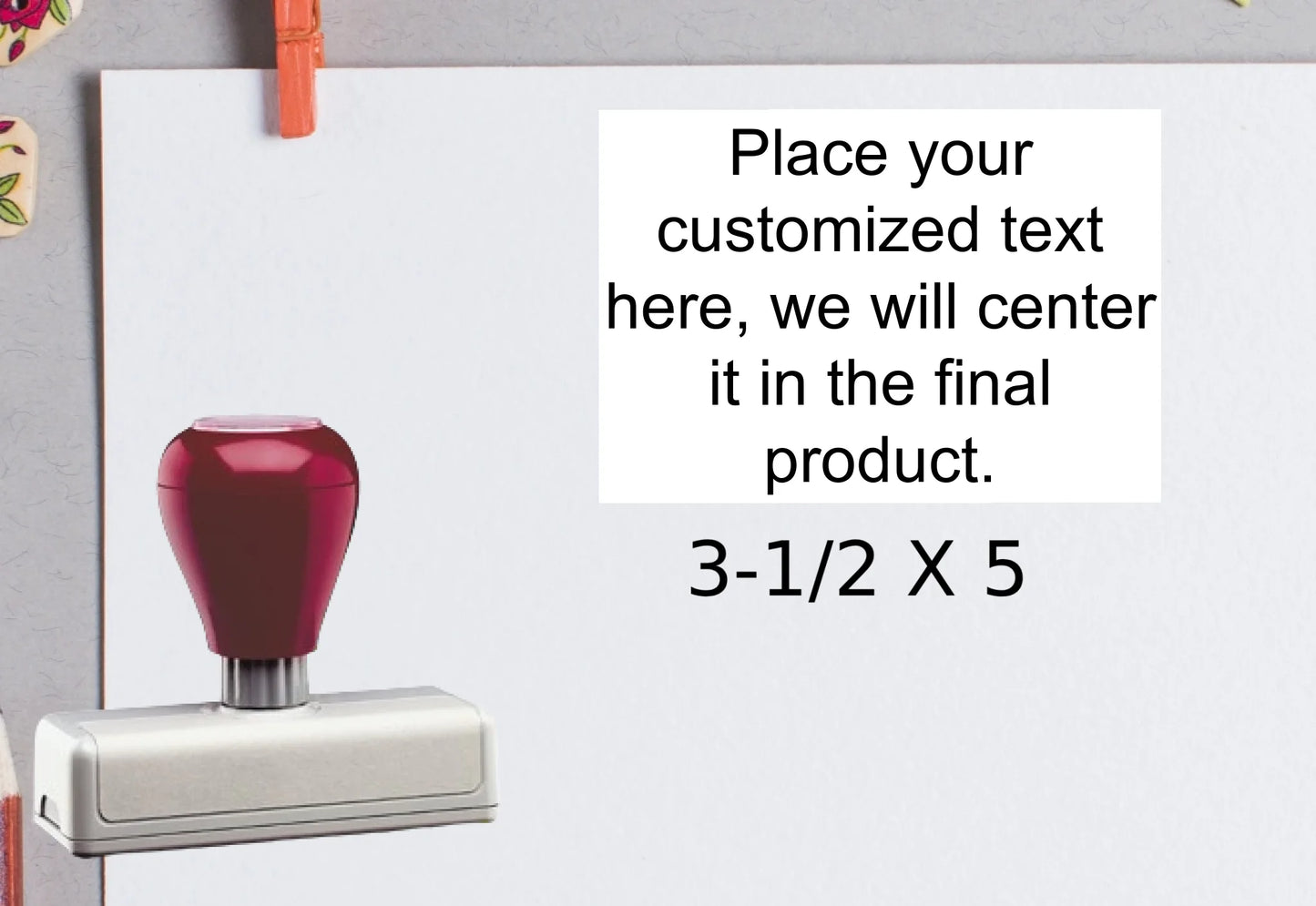 blank-white-page-with-clothes-peg-surrounded-with-stationeries-gray-background