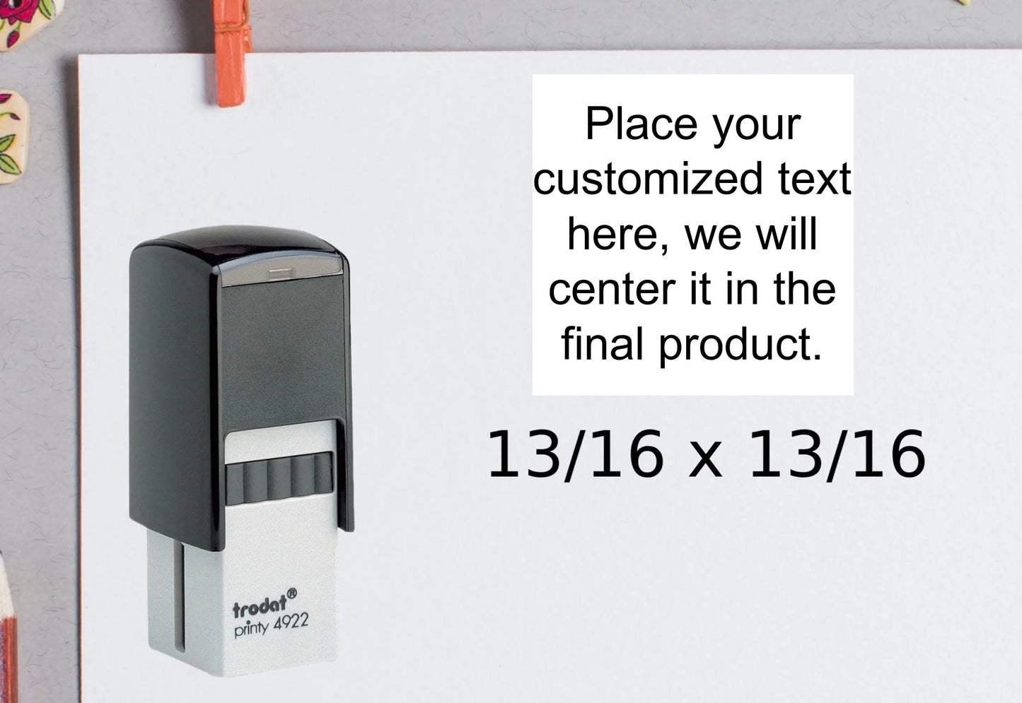 blank-white-page-with-clothes-peg-surrounded-with-stationeries-gray-background