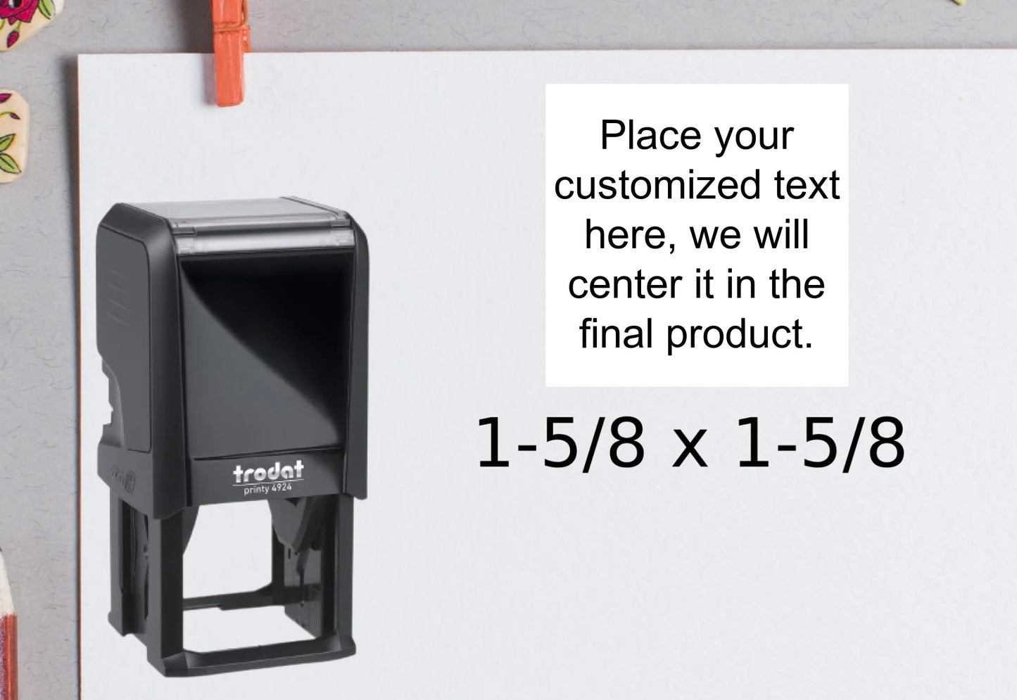 blank-white-page-with-clothes-peg-surrounded-with-stationeries-gray-background